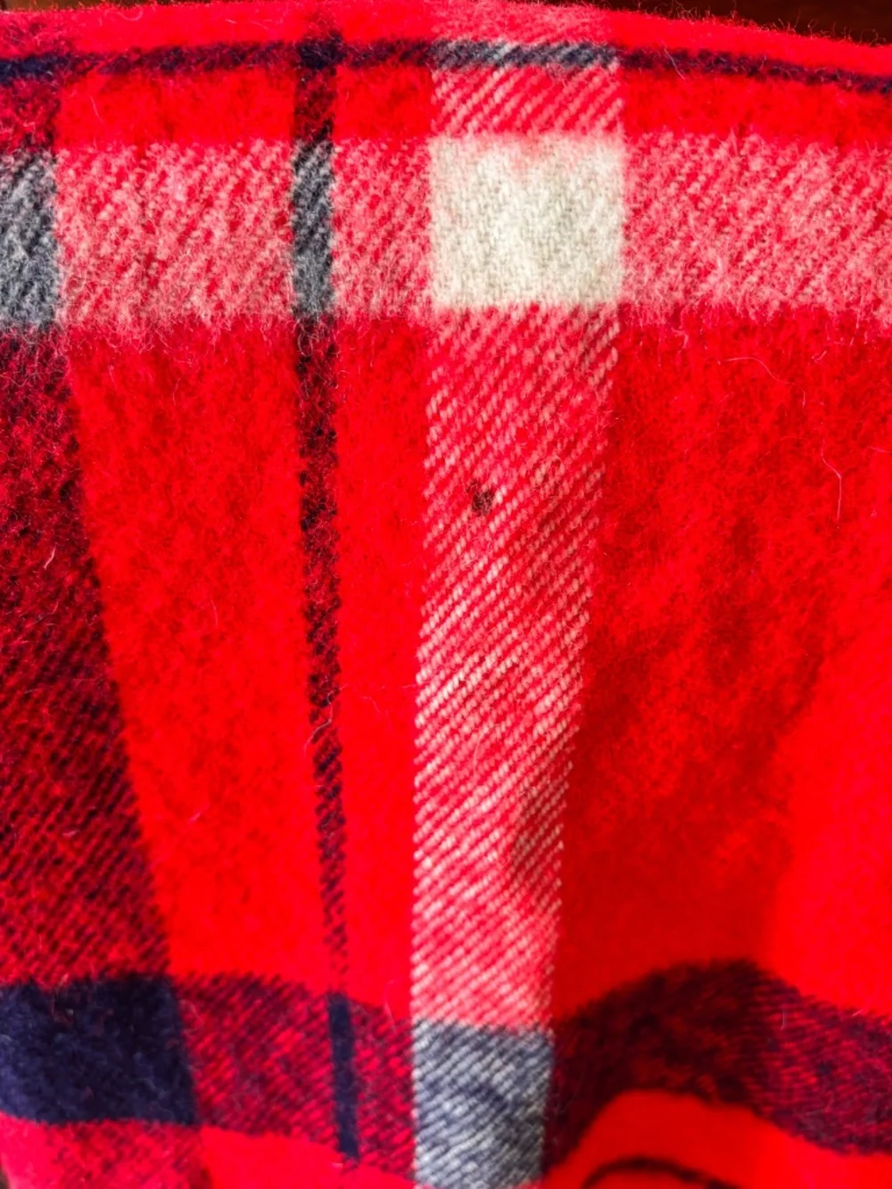 Vibrant vintage Harmony House red, white, blue tartan blanket